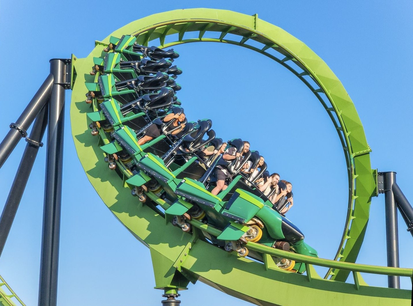 A corkscrew toward the end of Green Lantern's coaster track. The track is light green. The train is darker green.