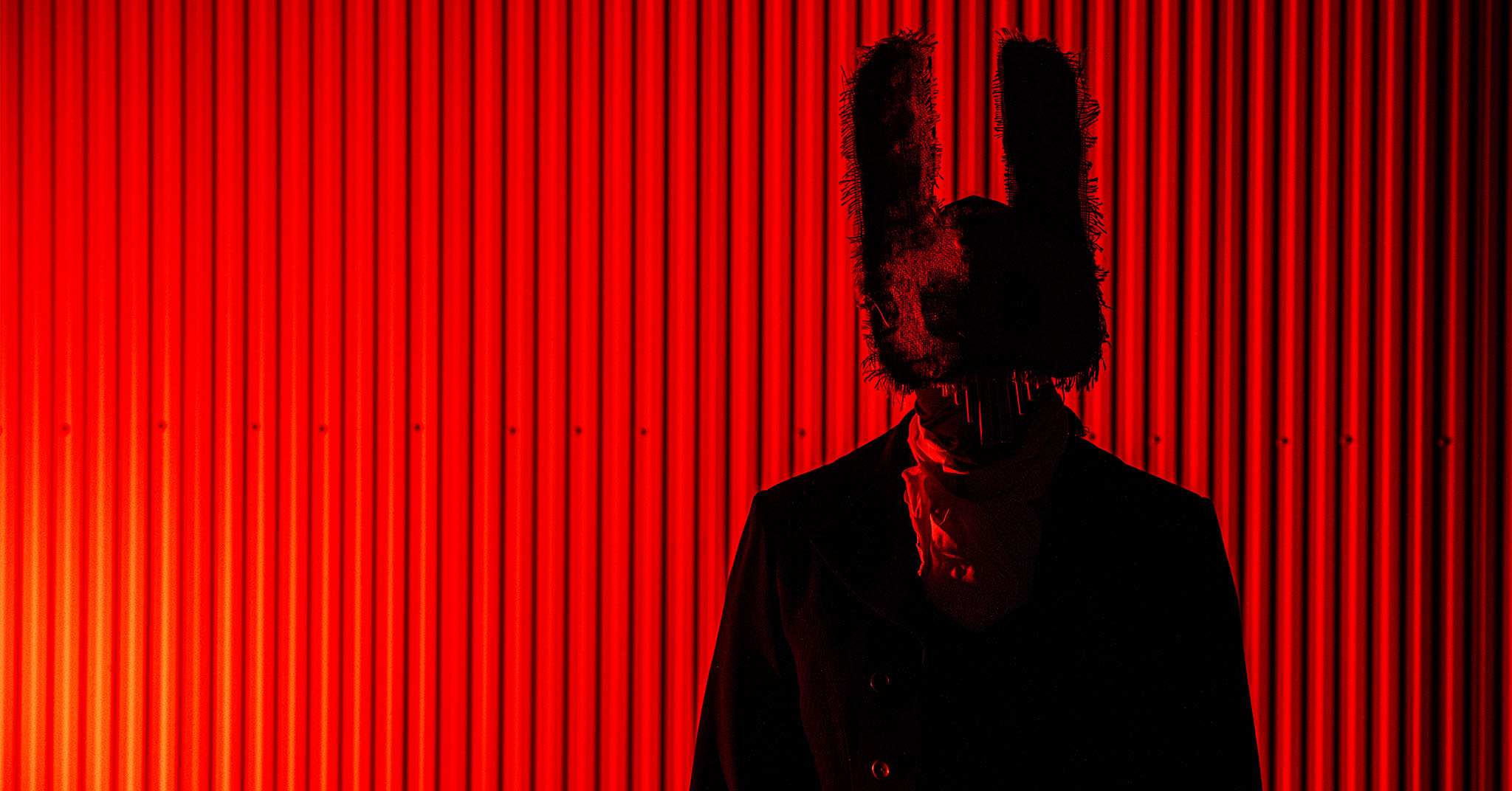 A scary bunny backlit with red light.