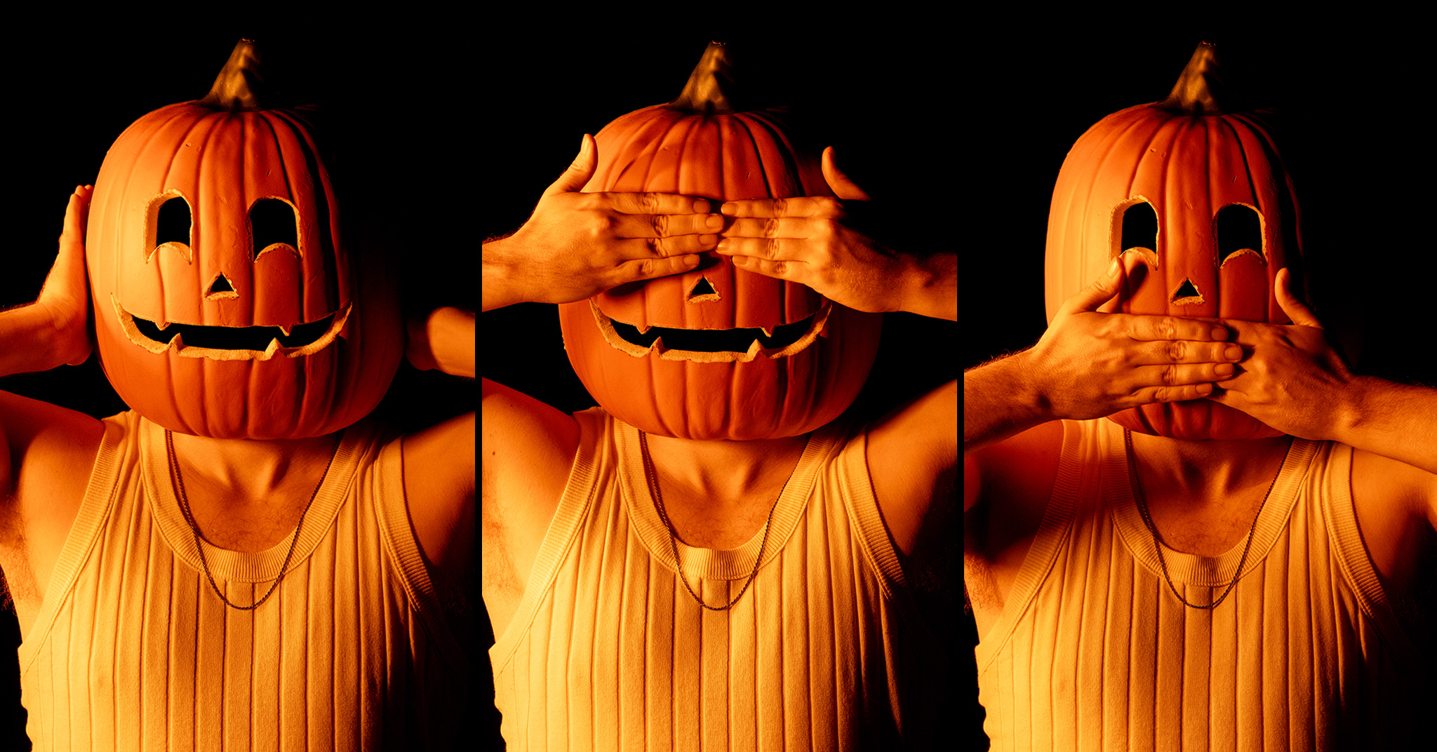 A jack-o-lantern cosplay doing "Hear no evil, See no evil, Speak no evil.".